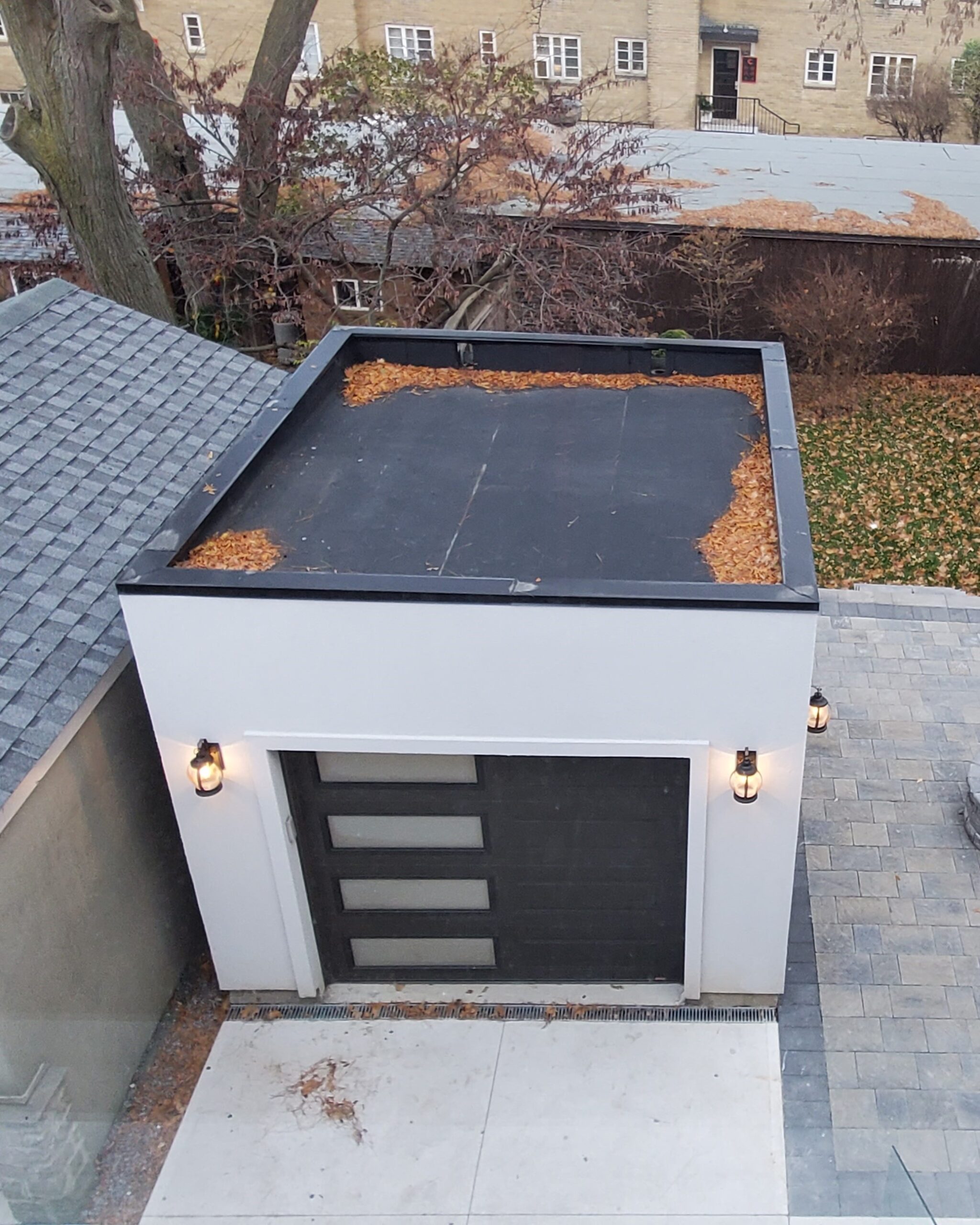 Custom renovated garage matching luxury home design in Toronto