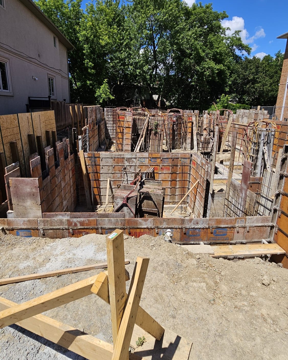 Foundation wall forms installed for custom home construction in North York