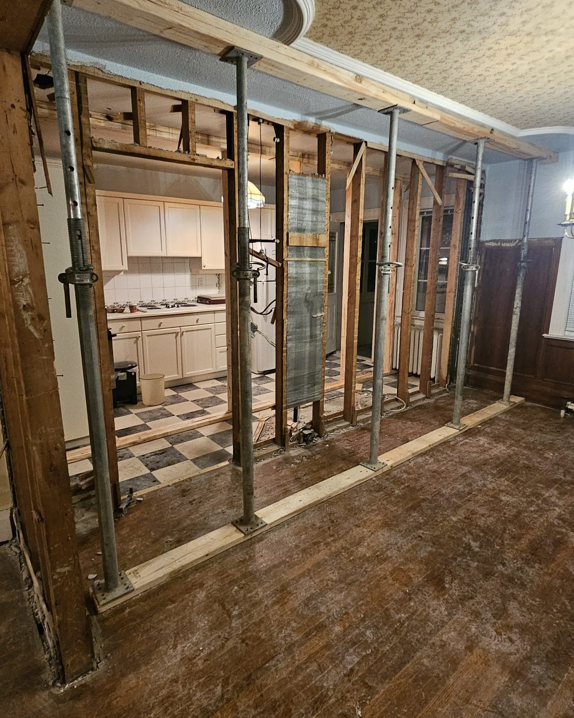 Load-bearing wall removal with structural support during home renovation in Midtown Toronto
