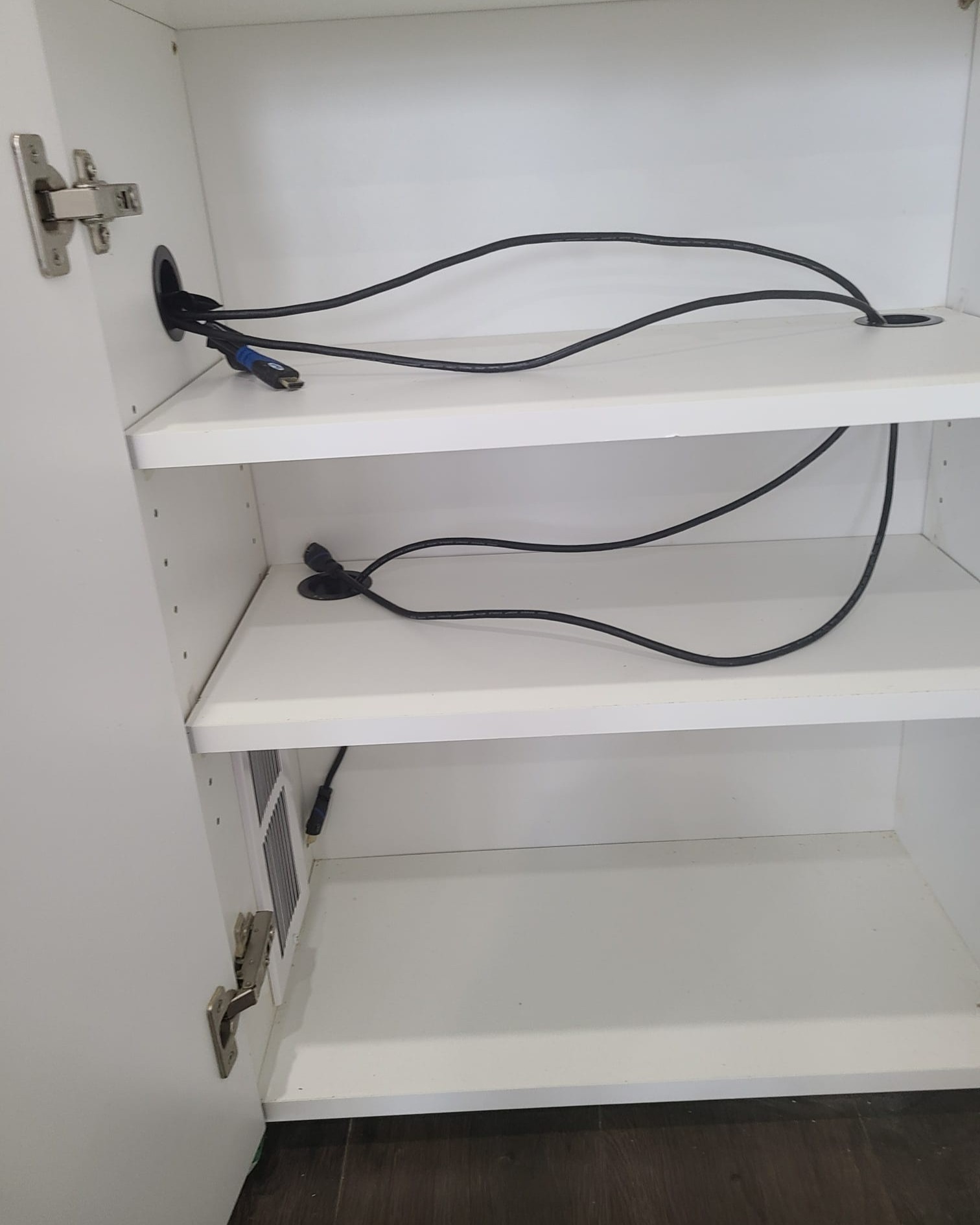 Power and outlet cables installed for built-in speaker during custom TV wall project in Toronto