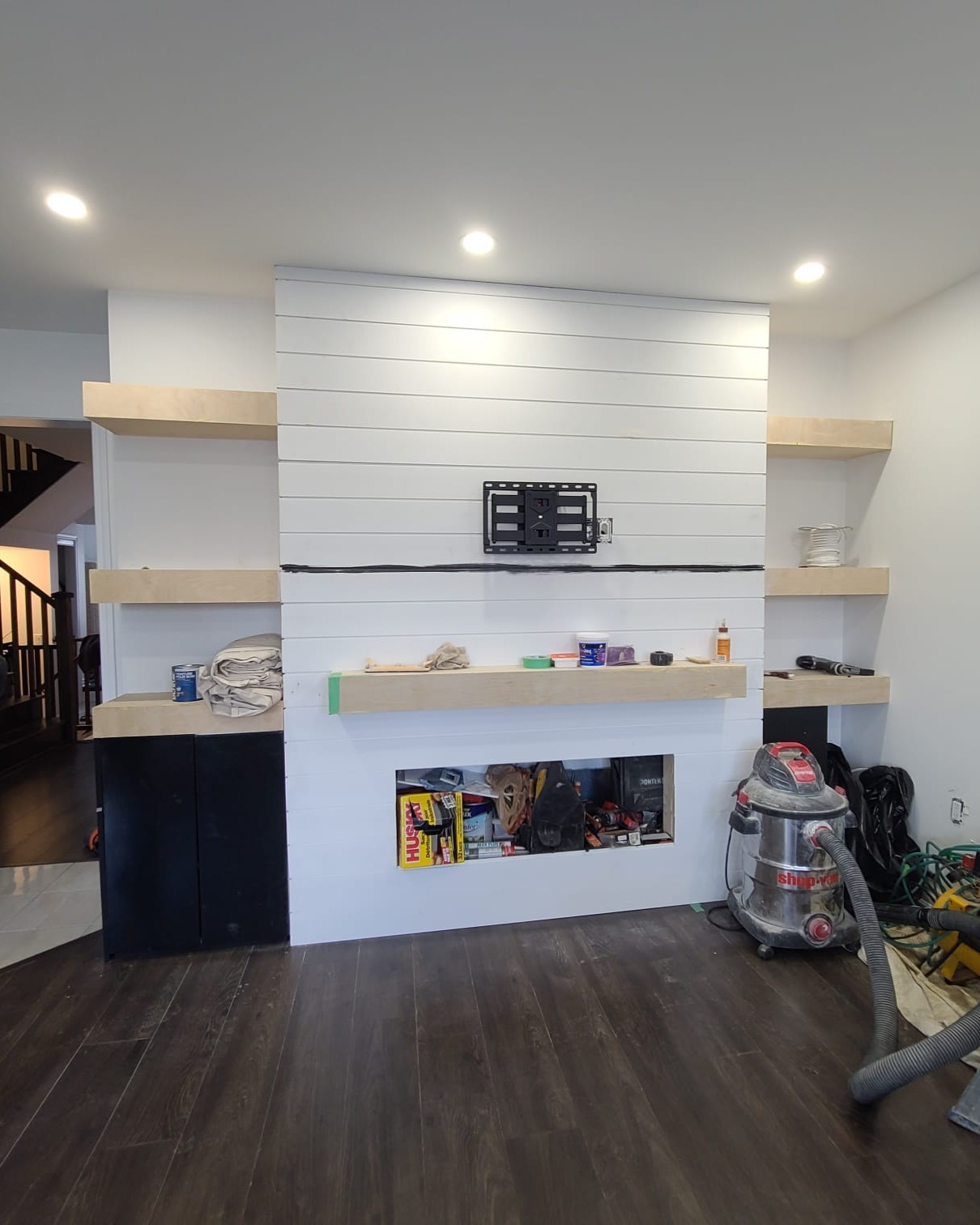 TV wall construction in progress during custom interior renovation in Toronto