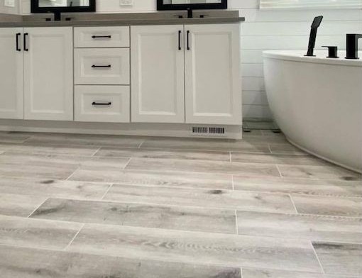 water-resistant luxury vinyl plank flooring in a contemporary bathroom setting