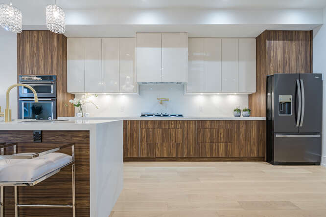 A modern looking kitchen design with clean lines, minimalist cabinets, and natural lighting








