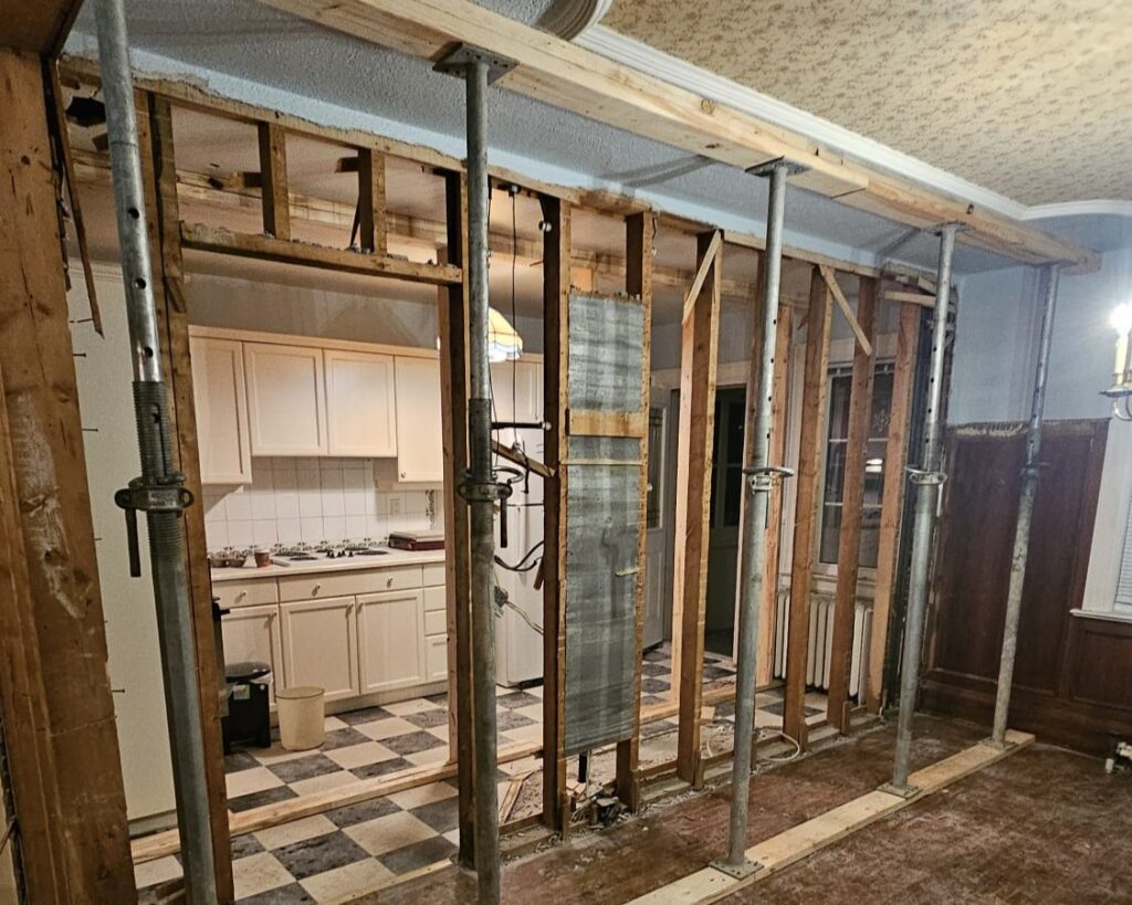 Kitchen with walls removed to create an open-concept space connected to the living area
