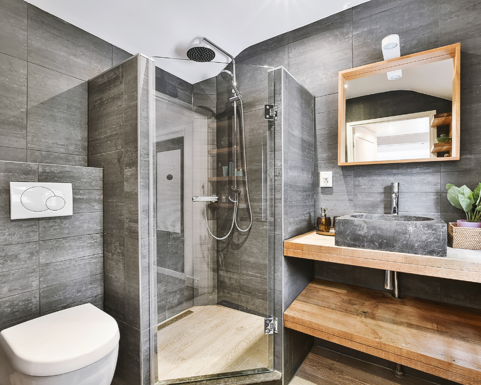 organic modern bathroom with natural wood, stone accents, and minimalist Japandi design