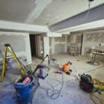 Basement under construction in a Toronto home with exposed framing and insulation