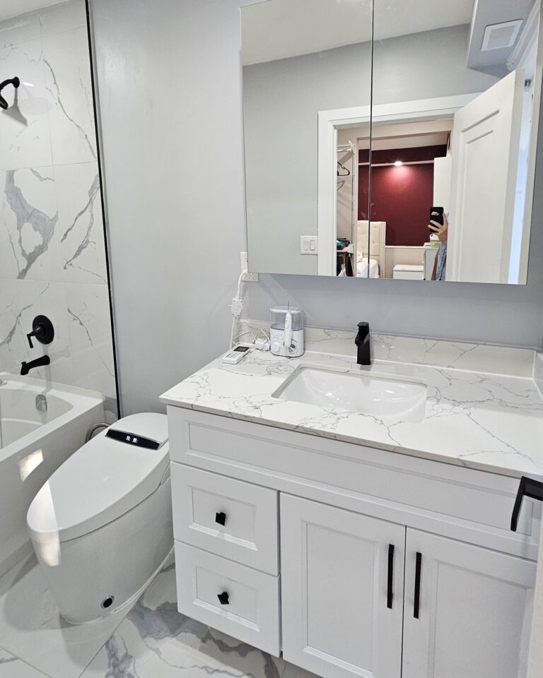 Newly added bathroom with modern finishes, clean tile work, and contemporary layout