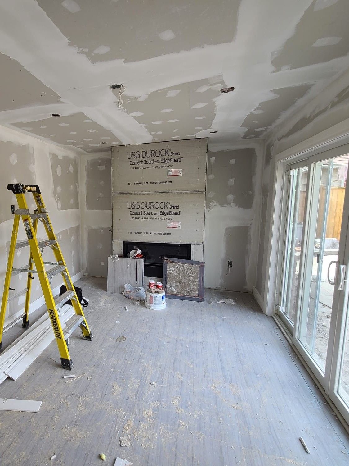 Interior construction of custom cabana house in Central Ajax with drywall installation and finishes in progress.