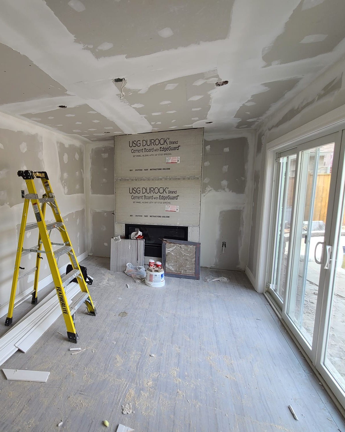 Interior construction of custom cabana house in Central Ajax with drywall installation and finishes in progress.