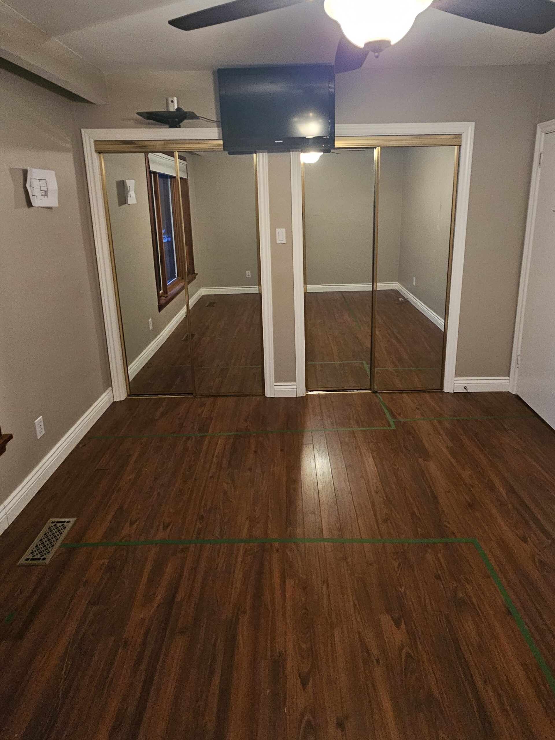 master-bedroom-before-renovation-mirror-closet-doors